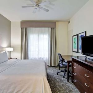 Cozy king room with work desk at Homewood Suites By Hilton Newark-Cranford.