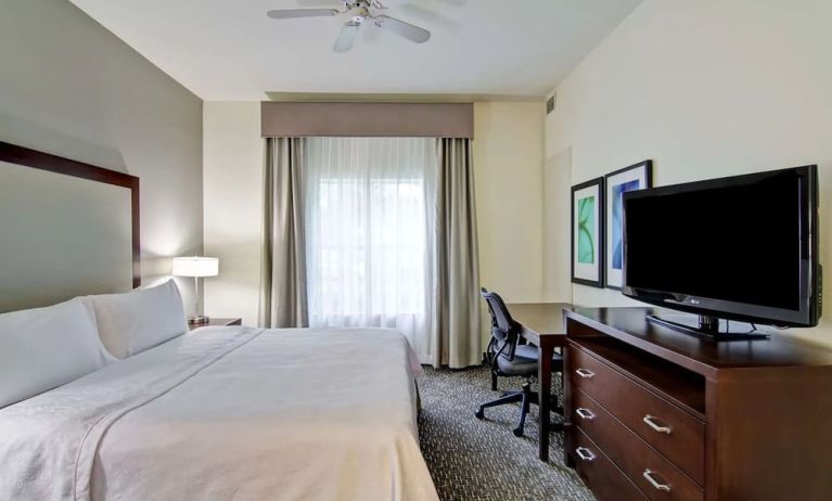 Cozy king room with work desk at Homewood Suites By Hilton Newark-Cranford.