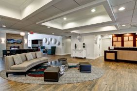 Lobby and coworking lounge at Homewood Suites By Hilton Newark-Cranford.