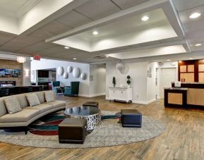 Lobby and coworking lounge at Homewood Suites By Hilton Newark-Cranford.