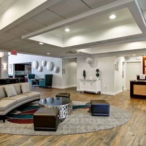 Lobby and coworking lounge at Homewood Suites By Hilton Newark-Cranford.