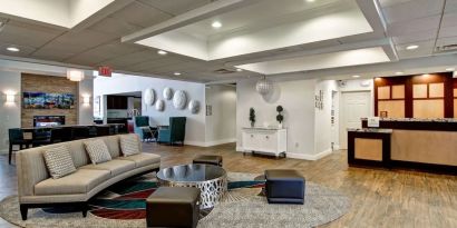 Lobby and coworking lounge at Homewood Suites By Hilton Newark-Cranford.