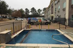 Outdoor pool available at Super 8 Bedford DFW Airport West.  