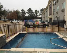 Outdoor pool available at Super 8 Bedford DFW Airport West.  