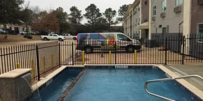 Outdoor pool available at Super 8 Bedford DFW Airport West.  