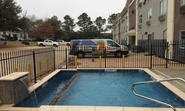 Outdoor pool available at Super 8 Bedford DFW Airport West.  