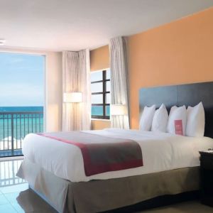 Romantic king room with sea view at Ramada Plaza Marco Polo Beach Resort.