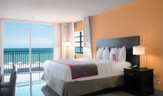 Romantic king room with sea view at Ramada Plaza Marco Polo Beach Resort.