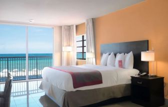 Romantic king room with sea view at Ramada Plaza Marco Polo Beach Resort.