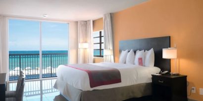 Romantic king room with sea view at Ramada Plaza Marco Polo Beach Resort.