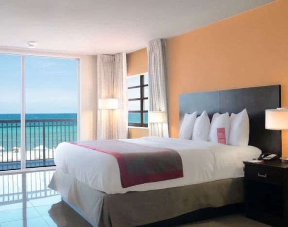 Romantic king room with sea view at Ramada Plaza Marco Polo Beach Resort.