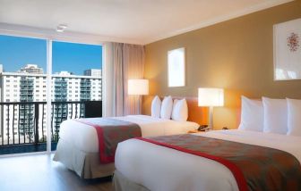 Two queen beds at Ramada Plaza Marco Polo Beach Resort.