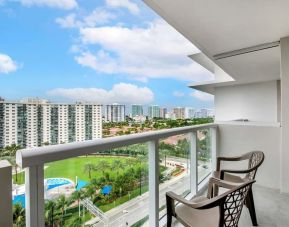 Day room with balcony at Ramada Plaza Marco Polo Beach Resort.