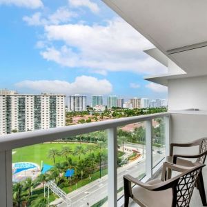 Day room with balcony at Ramada Plaza Marco Polo Beach Resort.