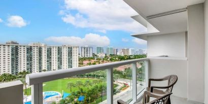 Day room with balcony at Ramada Plaza Marco Polo Beach Resort.