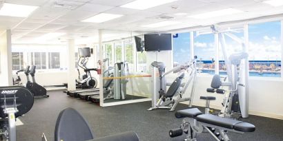 Fitness center at Ramada Plaza Marco Polo Beach Resort.