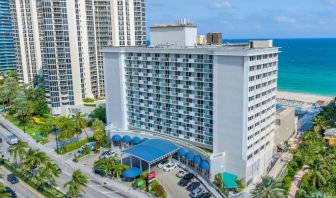 Hotel exterior and city view at Ramada Plaza Marco Polo Beach Resort.