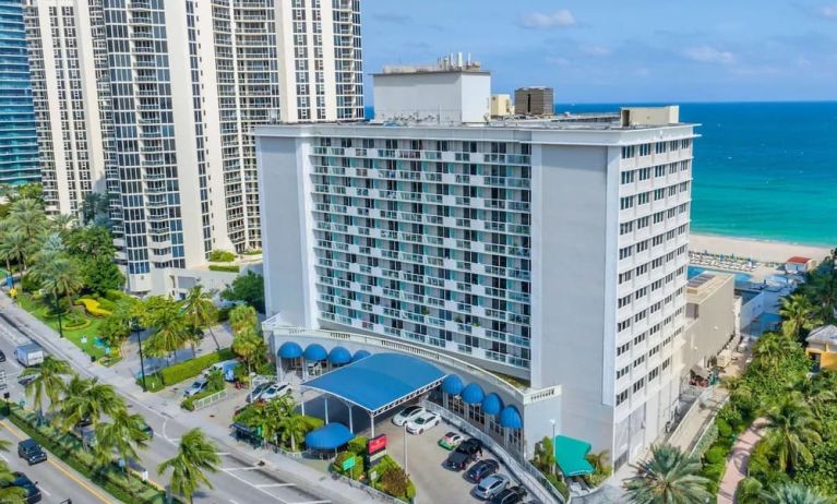 Hotel exterior and city view at Ramada Plaza Marco Polo Beach Resort.