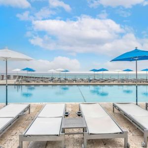 Relaxing sun loungers at Ramada Plaza Marco Polo Beach Resort.