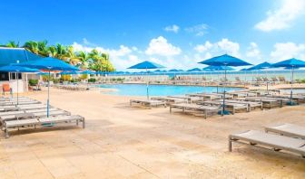 Relaxing pool area at Ramada Plaza Marco Polo Beach Resort.