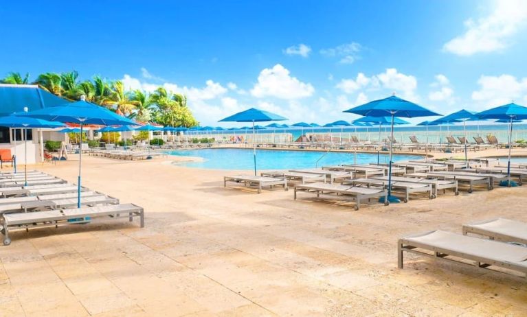 Relaxing pool area at Ramada Plaza Marco Polo Beach Resort.