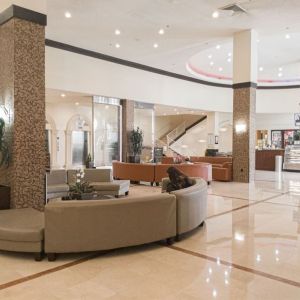 Lobby seating at Ramada Plaza Marco Polo Beach Resort.