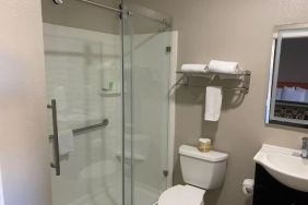 Guest bathroom with shower at North Bay Inn.