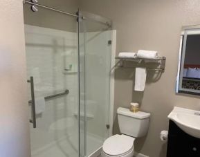 Guest bathroom with shower at North Bay Inn.