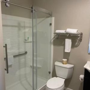 Guest bathroom with shower at North Bay Inn.