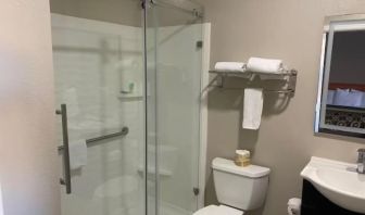 Guest bathroom with shower at North Bay Inn.