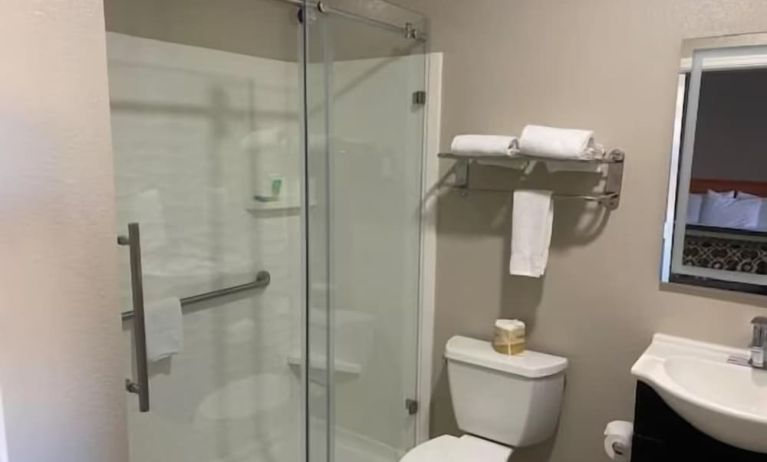 Guest bathroom with shower at North Bay Inn.