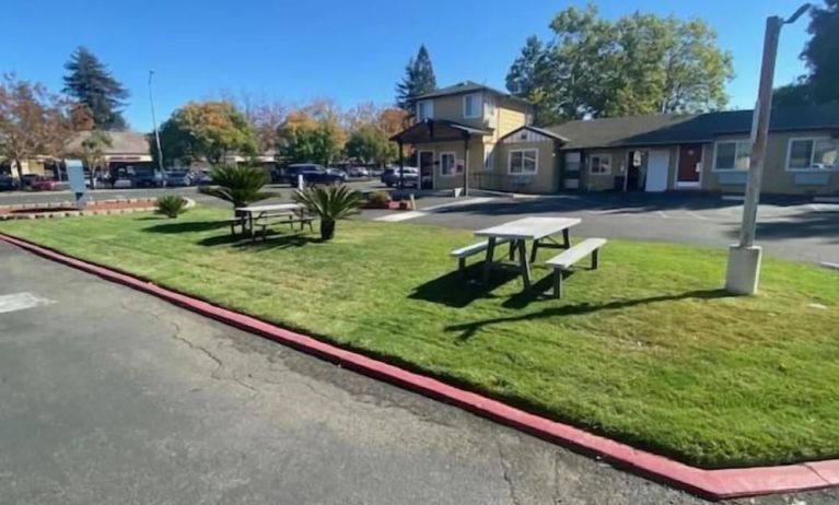 Outdoor garden seating at North Bay Inn.