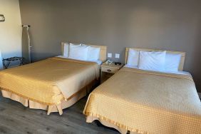 Two queen beds in this day room at North Bay Inn.