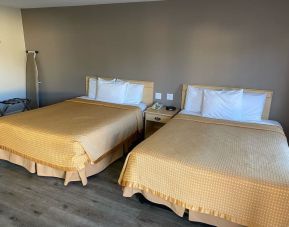 Two queen beds in this day room at North Bay Inn.