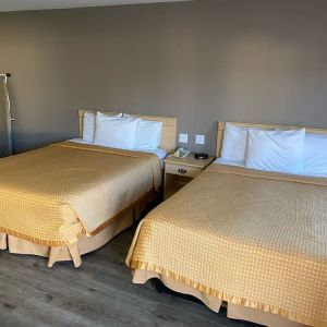 Two queen beds in this day room at North Bay Inn.