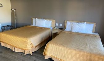 Two queen beds in this day room at North Bay Inn.