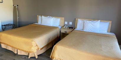 Two queen beds in this day room at North Bay Inn.