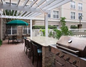 Outdoor barbeque area at Homewood Suites By Hilton Austin NW Near The Domain.