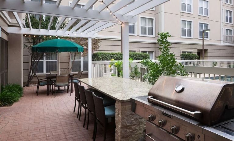 Outdoor barbeque area at Homewood Suites By Hilton Austin NW Near The Domain.