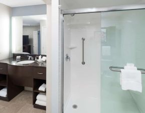 Guest bathroom with shower at Homewood Suites By Hilton Austin NW Near The Domain.