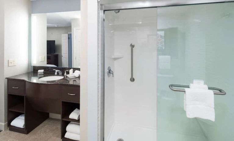 Guest bathroom with shower at Homewood Suites By Hilton Austin NW Near The Domain.