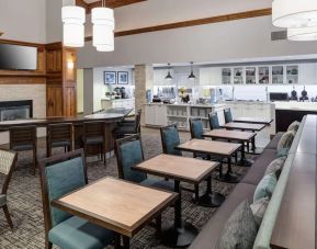 Dining and coworking space at Homewood Suites By Hilton Austin NW Near The Domain.