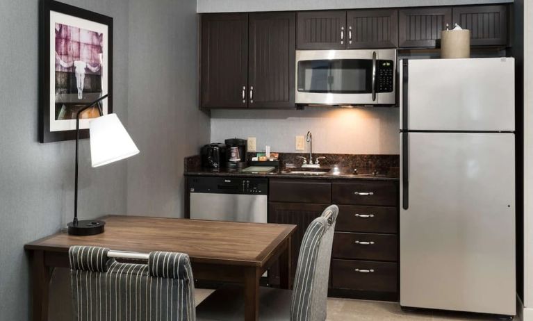 Day room with kitchen at Homewood Suites By Hilton Austin NW Near The Domain.