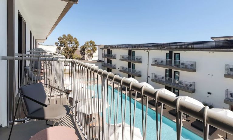 Day room with balcony at Lum Hotel Inglewood.