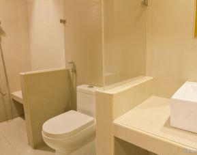 Guest bathroom with shower at Victoria Court Las Piñas.