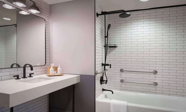 Guest bathroom with shower at Freepoint Hotel Cambridge, A Tapestry Collection. 