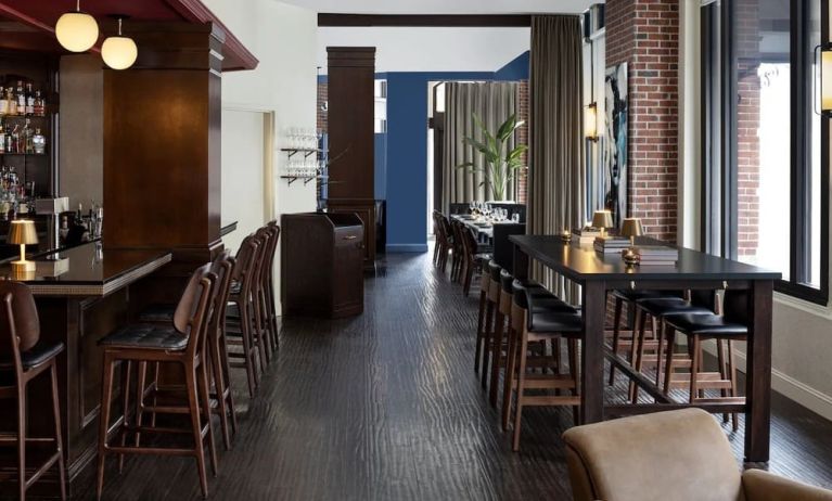 Dining area and bar at The Boxer Boston.