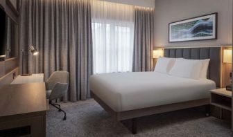 King bedroom with natural light at DoubleTree By Hilton London Angel Kings Cross.