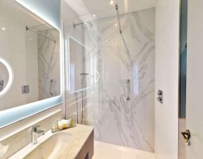 Guest bathroom with shower at DoubleTree By Hilton London Angel Kings Cross.