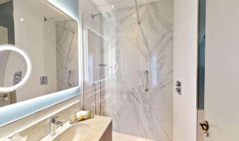 Guest bathroom with shower at DoubleTree By Hilton London Angel Kings Cross.